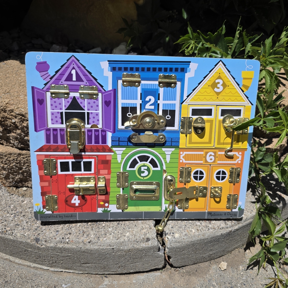 Melissa & Doug Latches Board - Colorful Interactive Toy